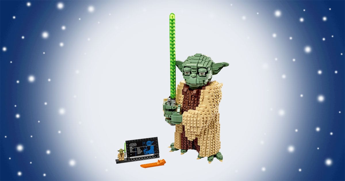 LEGO Star Wars Yoda buildable figure with green lightsaber, display plaque, and detailed robe design shown as collectible model.