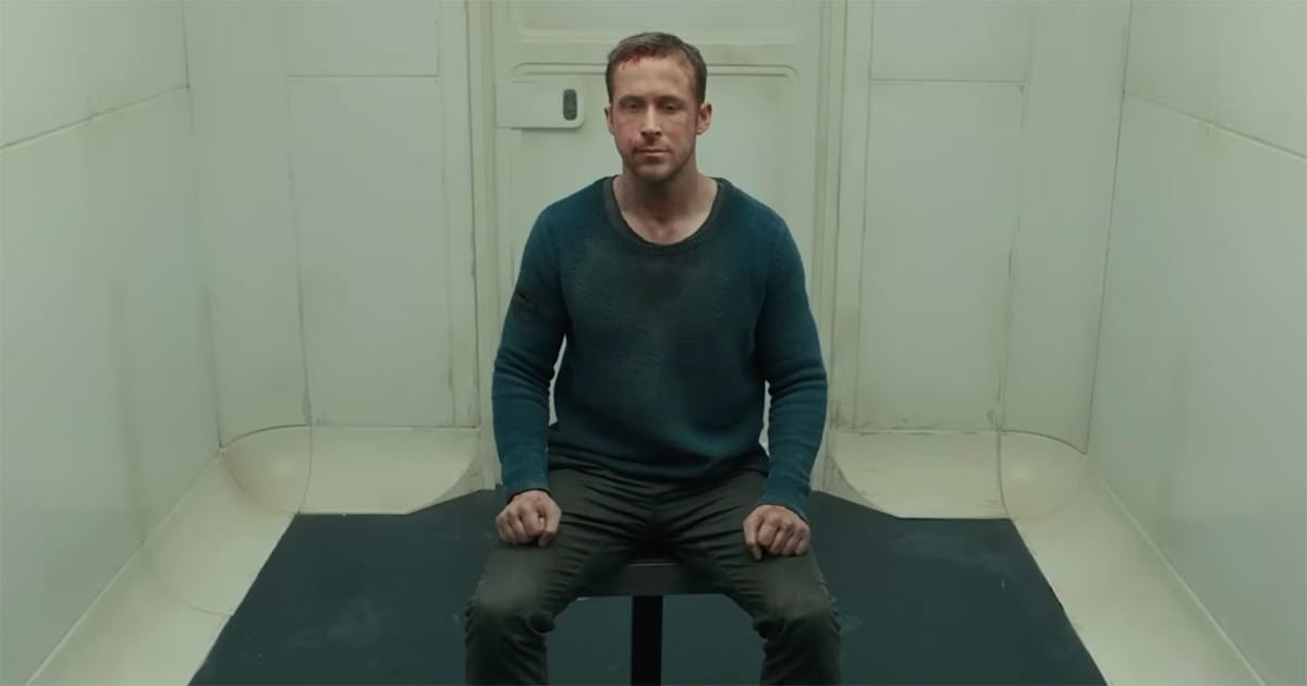 Officer K seated during a baseline test in “Blade Runner 2049” as part of Nexus-9 obedience conditioning.