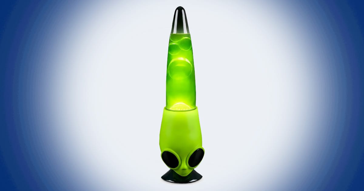 Green alien head motion lamp with glowing wax bubbles inspired by retro UFO culture and classic extraterrestrial science fiction.