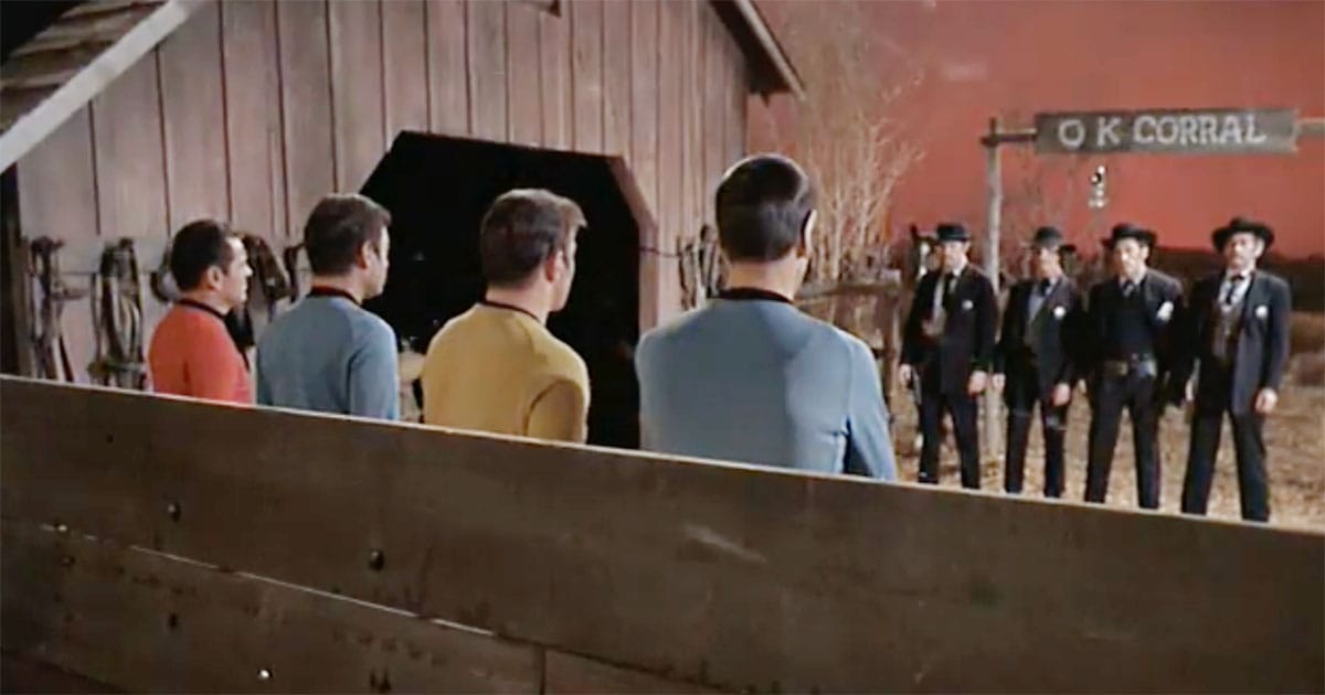 The Enterprise crew stands in the stylized western setting of “Spectre of the Gun.”