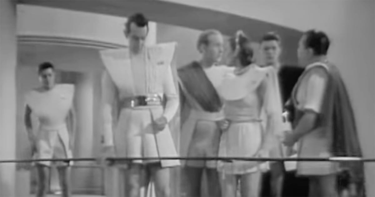 Leaders in a futuristic society in "Things to Come" (1936) representing control, planning, and technological authority.