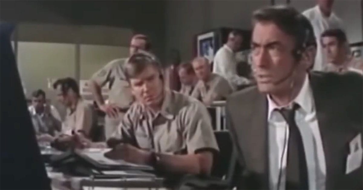 Charles Keith and mission controllers work to develop a rescue plan in "Marooned".
