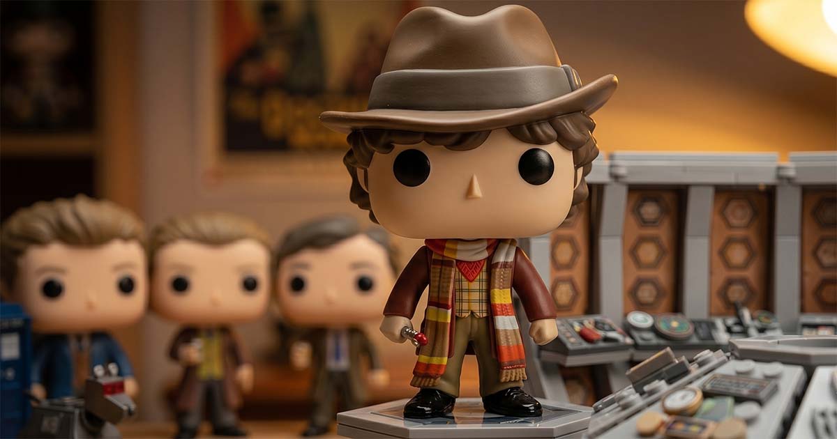 Fourth Doctor Funko Pop figure wearing a scarf and hat, displayed inside a TARDIS control room setting with other Doctor Who collectibles in the background.