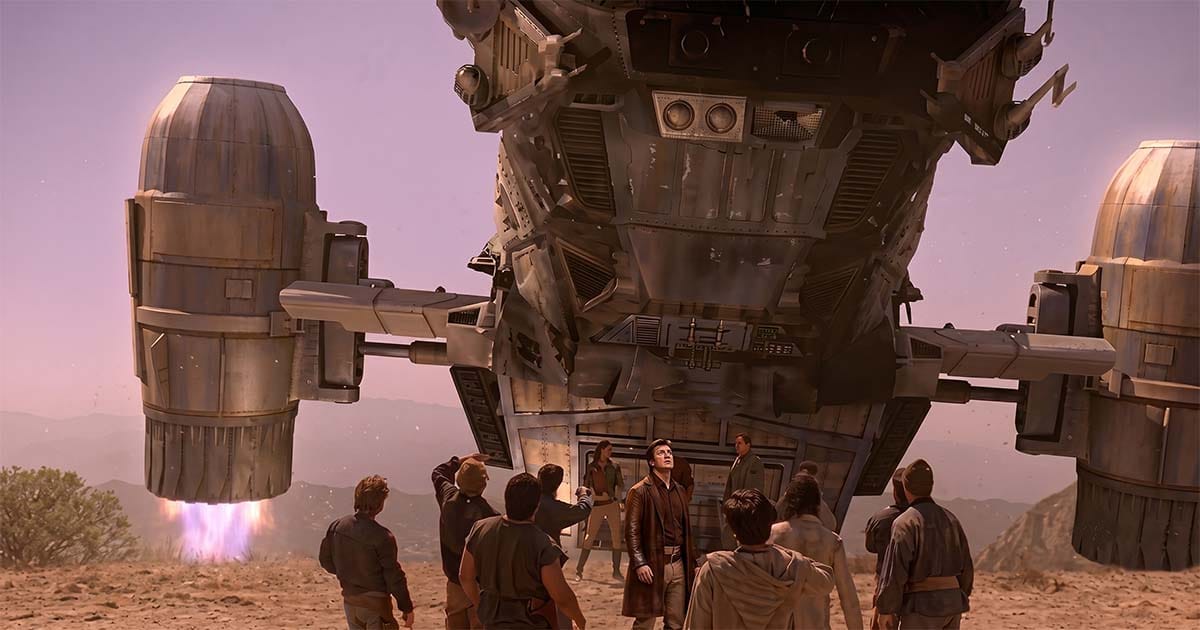 The spaceship Serenity hovers above a group of settlers gathered on a dusty frontier world in "Firefly."