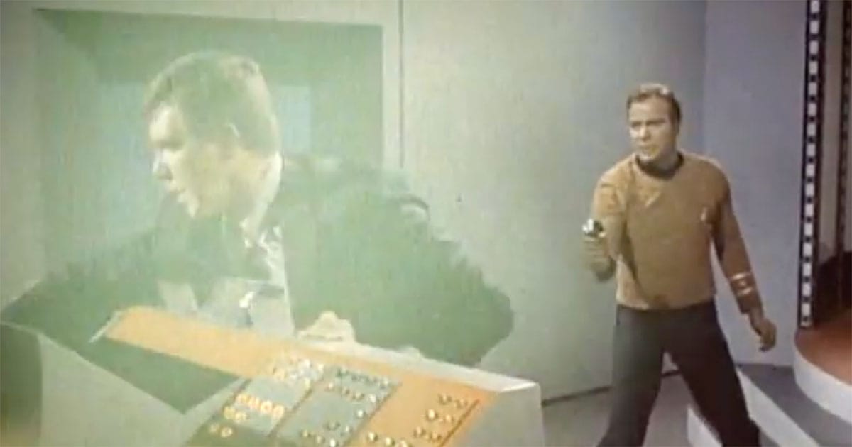 Captain Kirk confronts Gary Seven as Seven appears on the Enterprise viewscreen in the "Star Trek" episode "Assignment: Earth."