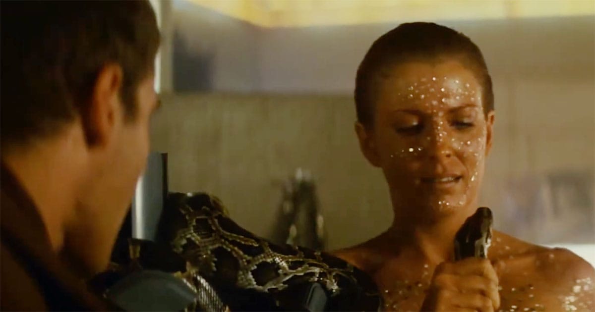 Zhora holding an artificial snake in "Blade Runner" (1982).