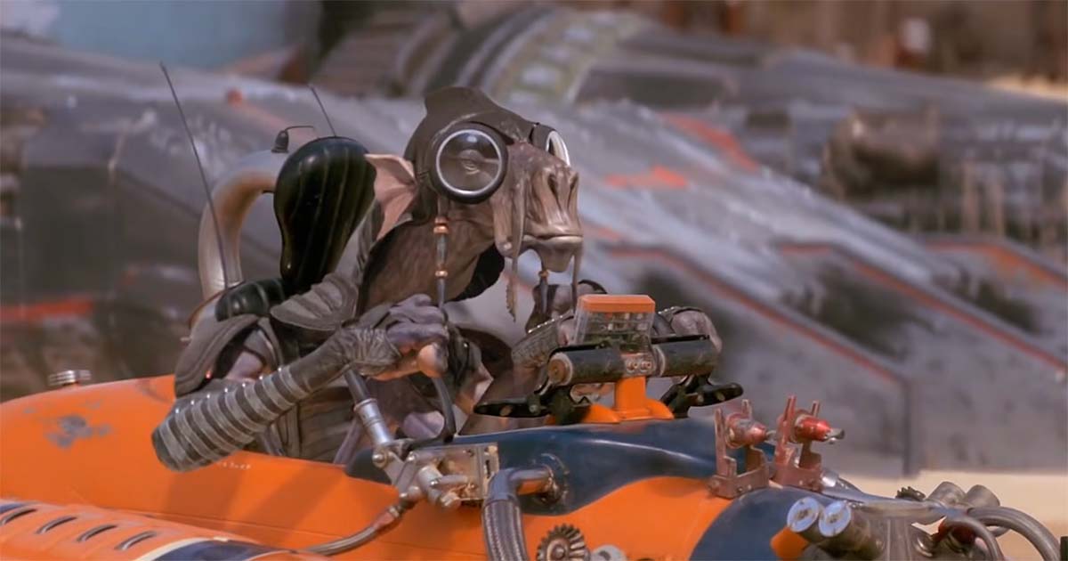 Watto sits in his vehicle near the podracing grounds on Tatooine, representing the commerce and local businesses that benefited from major racing events.