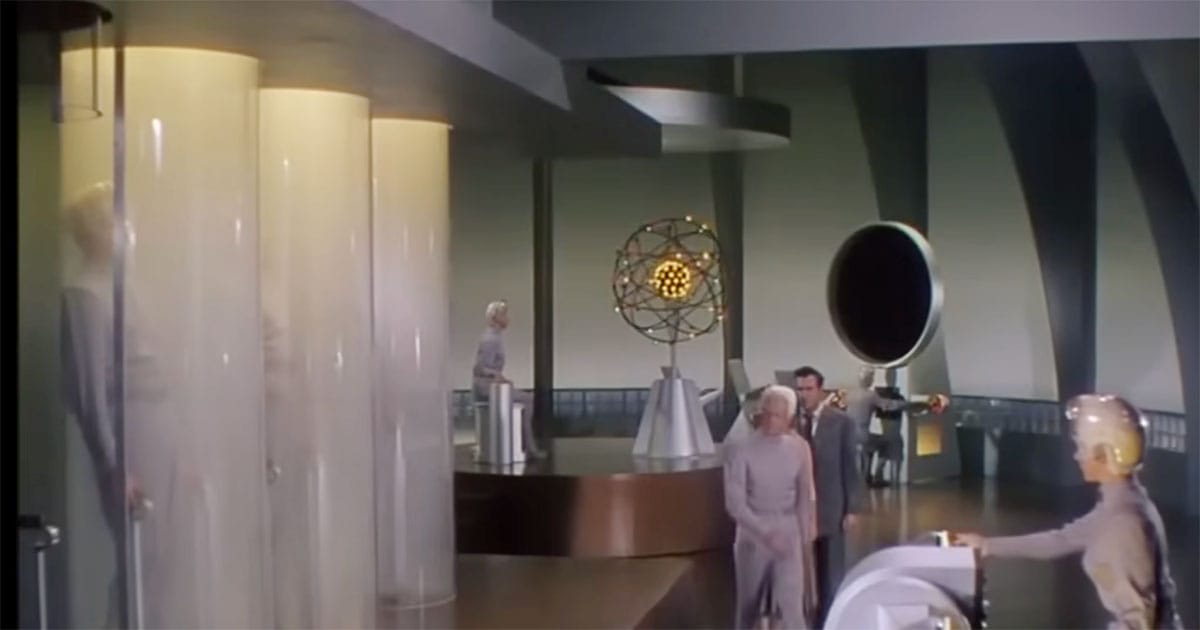 The vast Metalunan laboratory features translucent containment chambers, futuristic machinery, and scientists working inside the alien complex in This Island Earth (1955).