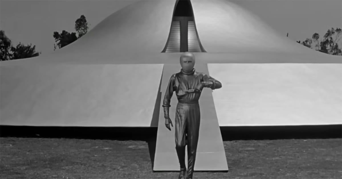 Klaatu walks away from his flying saucer after arriving on Earth in "The Day the Earth Stood Still" (1951).