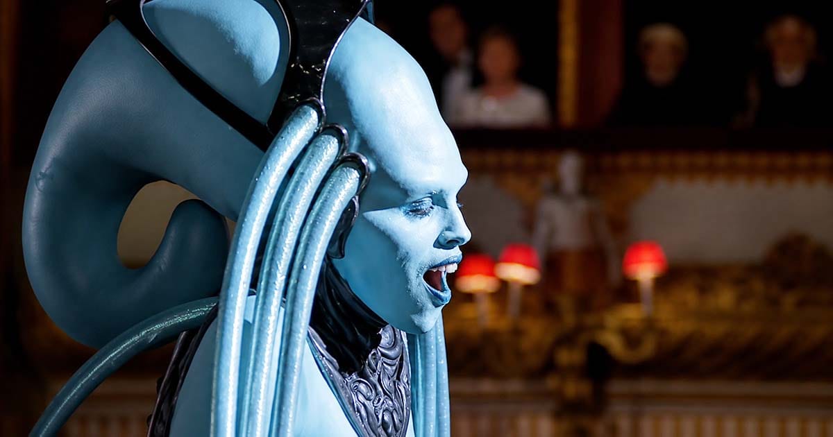 Profile of Diva Plavalaguna singing during the opera sequence in "The Fifth Element."