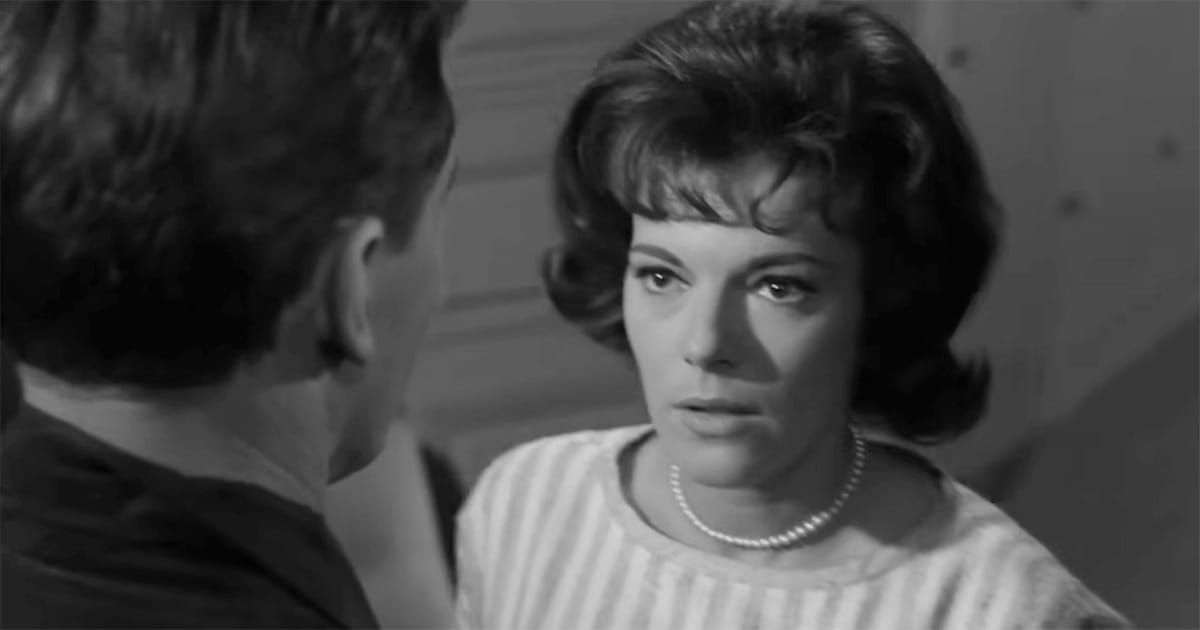Black-and-white scene from "The Twilight Zone" showing a woman staring uneasily at a man she realizes is not her husband.