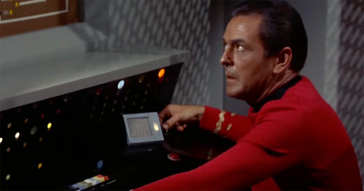 Chief Engineer Scotty works at a control panel aboard the Enterprise in the original “Star Trek” series.