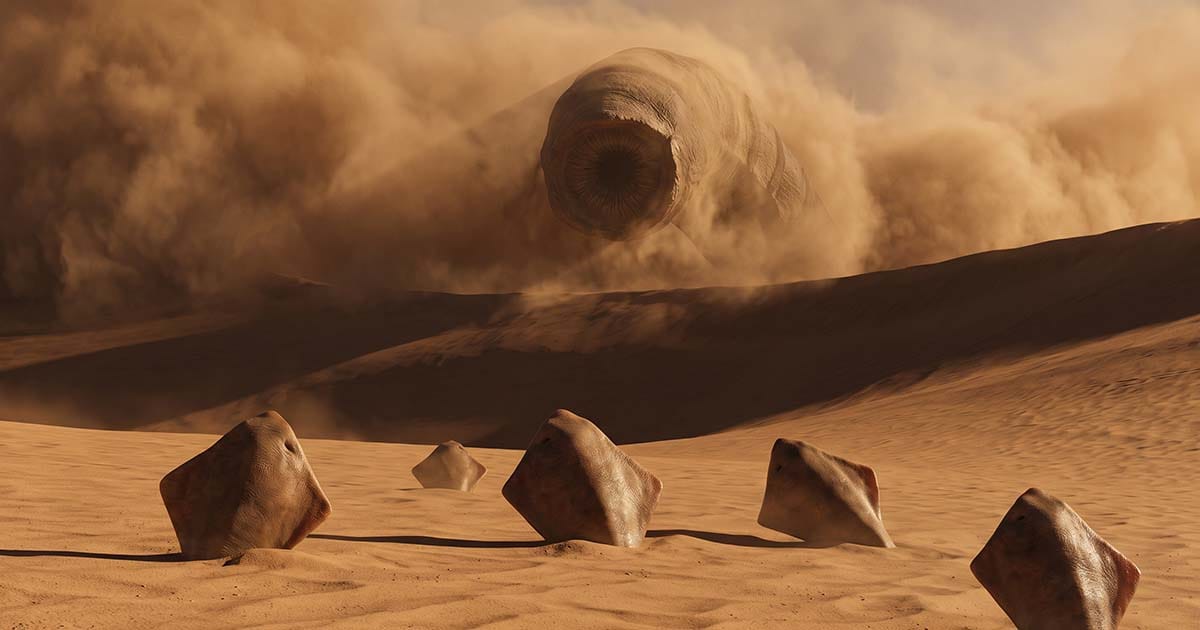 Small sandtrout emerge from the dunes as a massive sandworm rises through a cloud of sand on Arrakis.