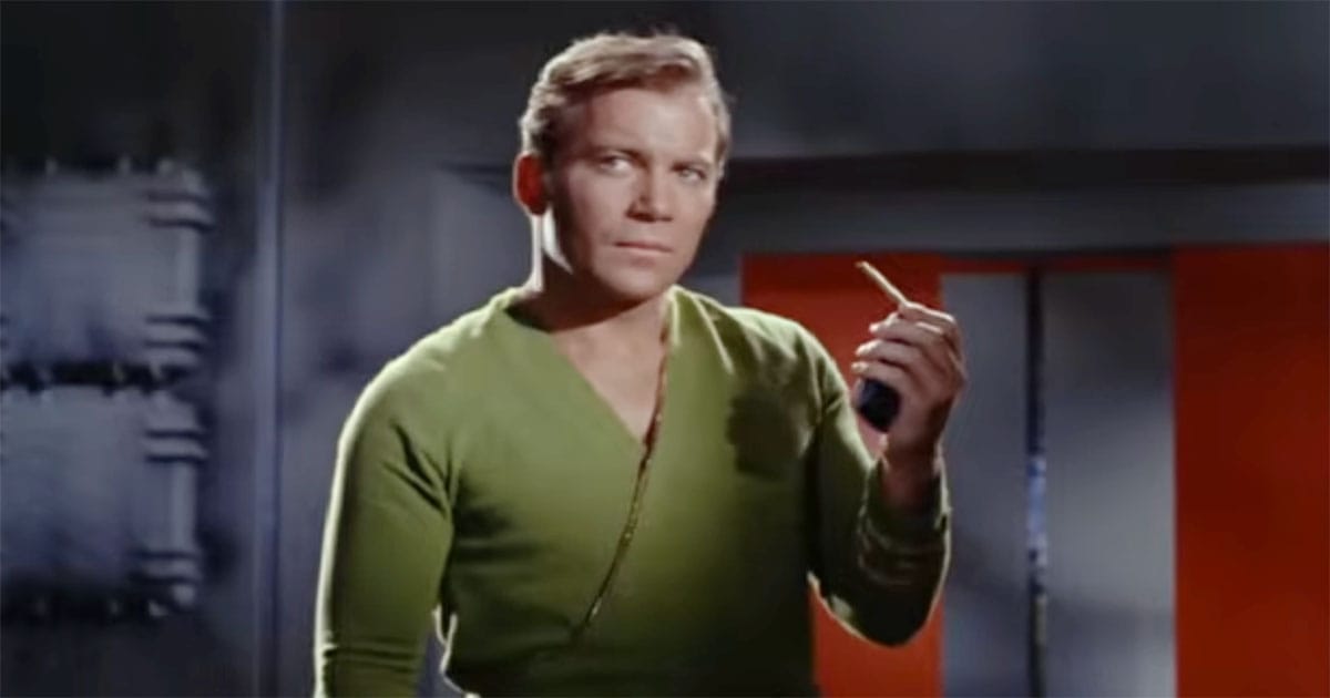 Captain Kirk holds an open communicator in a scene from the original “Star Trek” series.