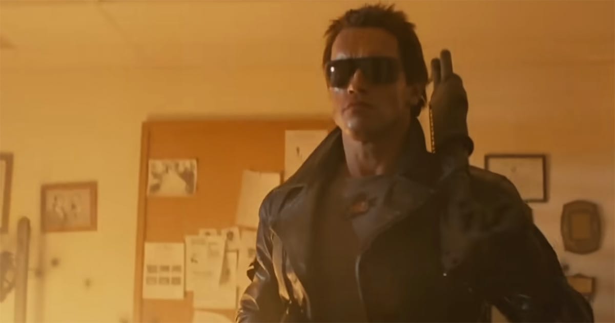 The damaged Terminator wearing sunglasses and carrying a shotgun in "The Terminator" (1984).