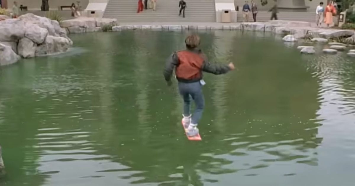 Marty McFly rides a hoverboard across the pond in Hill Valley in "Back to the Future Part II."