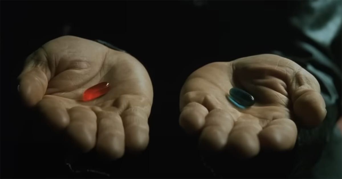 Close-up of two hands offering a red pill and a blue pill in a scene from "The Matrix."