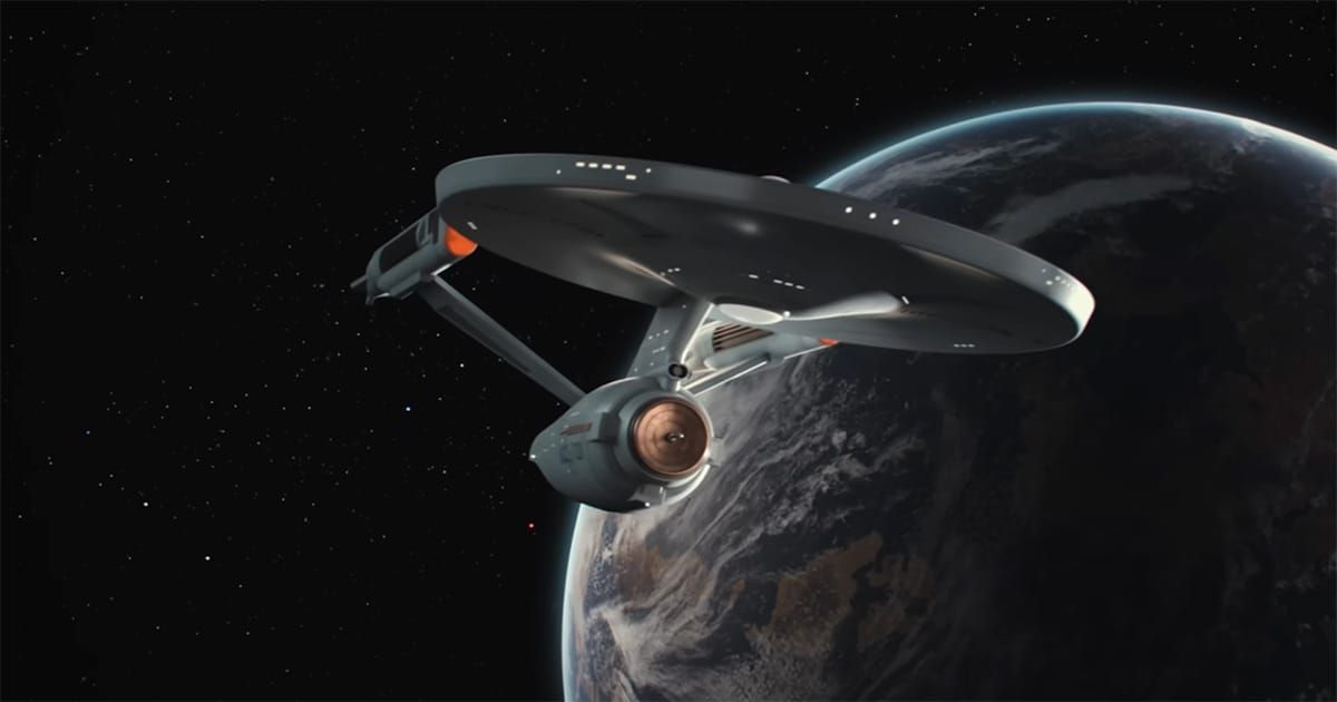 The refit USS Enterprise in orbit above a planet in Star Trek The Motion Picture, emphasizing scale, design, and the franchise’s transition from television to cinema.
