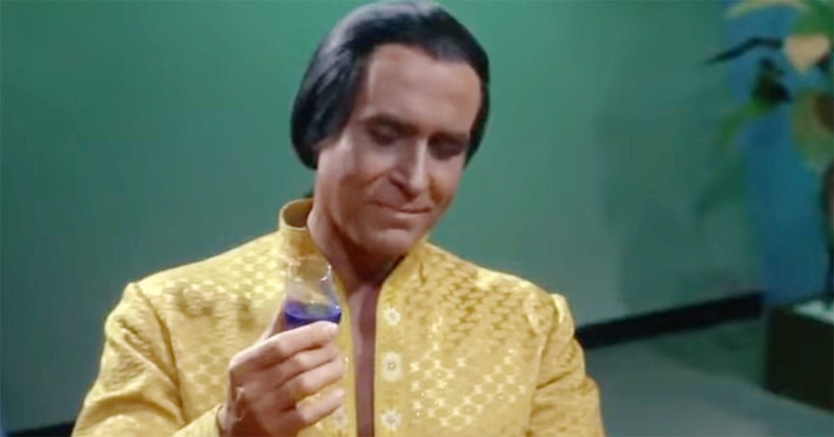 Khan Noonien Singh holding a drink in Star Trek The Original Series Space Seed scene.