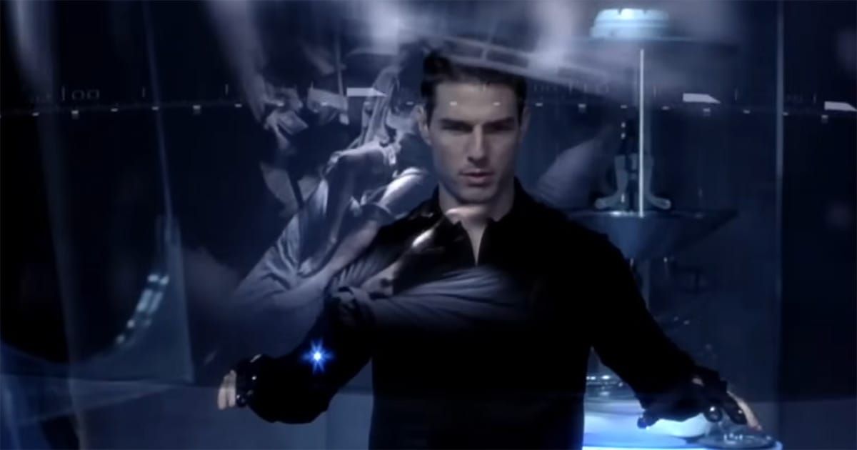 Tom Cruise using futuristic gesture interface to analyze crime predictions in Minority Report 2002