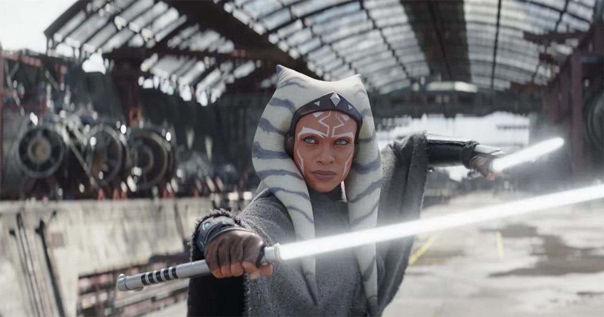 Ahsoka Tano holding dual white lightsabers in an industrial setting, representing the Grey Jedi concept in Star Wars.