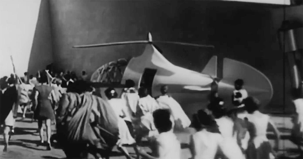 Crowd boarding a futuristic aircraft in "Things to Come" (1936), symbolizing technological progress and a new society.