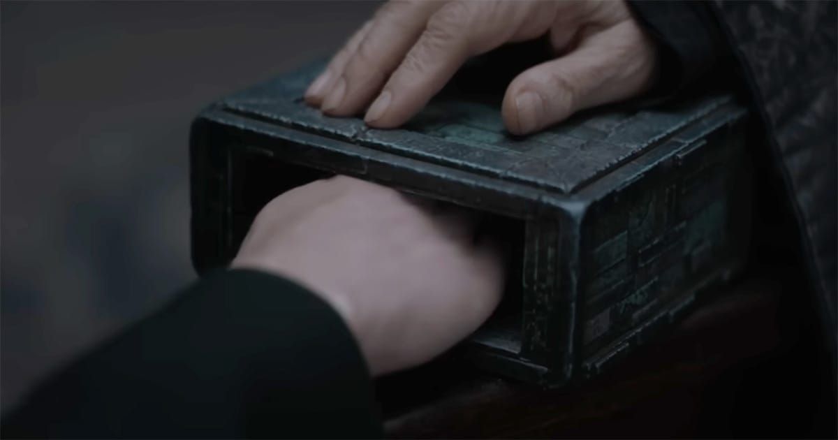 Hand inside pain box during Gom Jabbar test in "Dune"