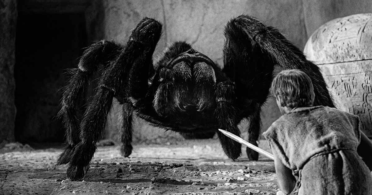 Scott Carey confronts a giant spider with a straight pin in “The Incredible Shrinking Man.”