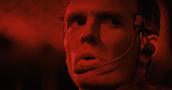 Michael Biehn as Hicks in red lighting, focused and prepared for battle. In the movie Aliens 1986.