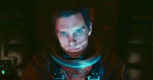 Dave Bowman in a space suit staring ahead aboard "Discovery One" in "2001: A Space Odyssey"