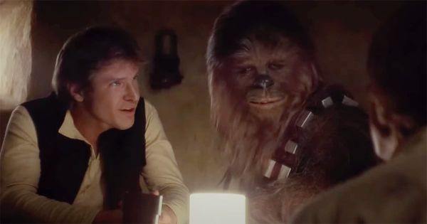 Han Solo and Chewbacca seated together in the Mos Eisley Cantina from "Star Wars" (1977)