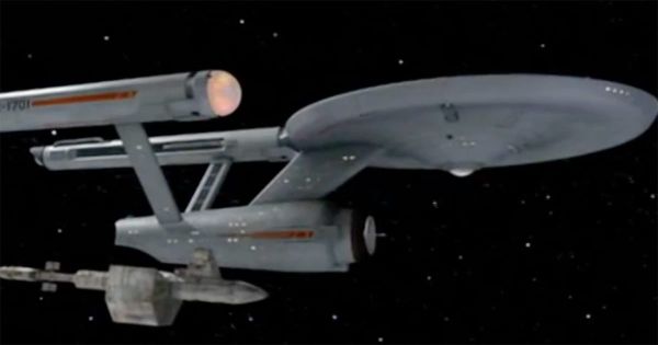 U.S.S. Enterprise NCC-1701 from Star Trek The Original Series flying through space.