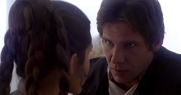 Han Solo looks intently at Leia aboard the Millennium Falcon, showing calm determination amid rising danger.