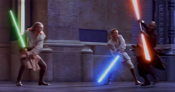 Jedi and Sith duel with green, blue, and red lightsabers showing the different colors and meanings in Star Wars.