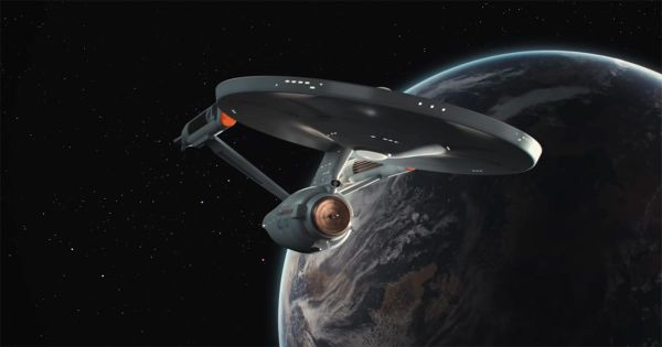 The refit USS Enterprise in orbit above a planet in Star Trek The Motion Picture, emphasizing scale, design, and the franchise’s transition from television to cinema.