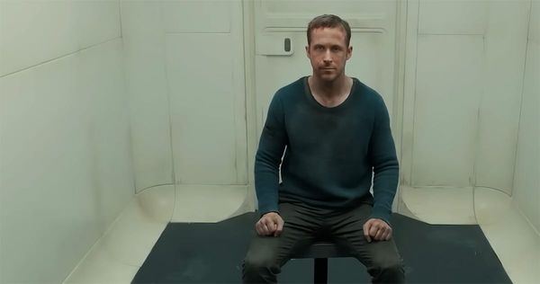 K sits in the Baseline Test chamber before a psychological evaluation in "Blade Runner 2049."