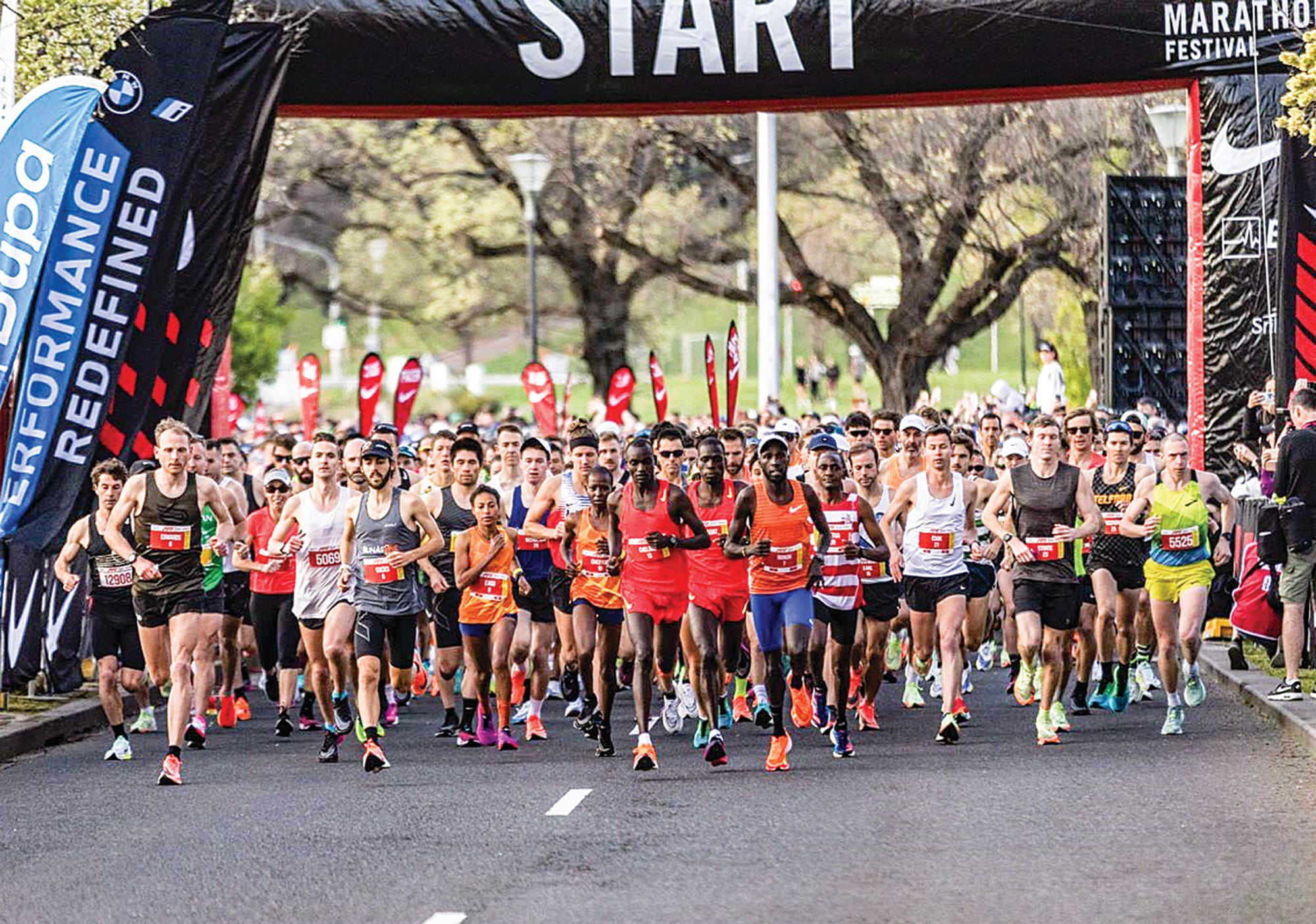 The runners take off to start the Melbourne Marathon, Luke Nicholson can be seen in the blue shirt a few rows back. 