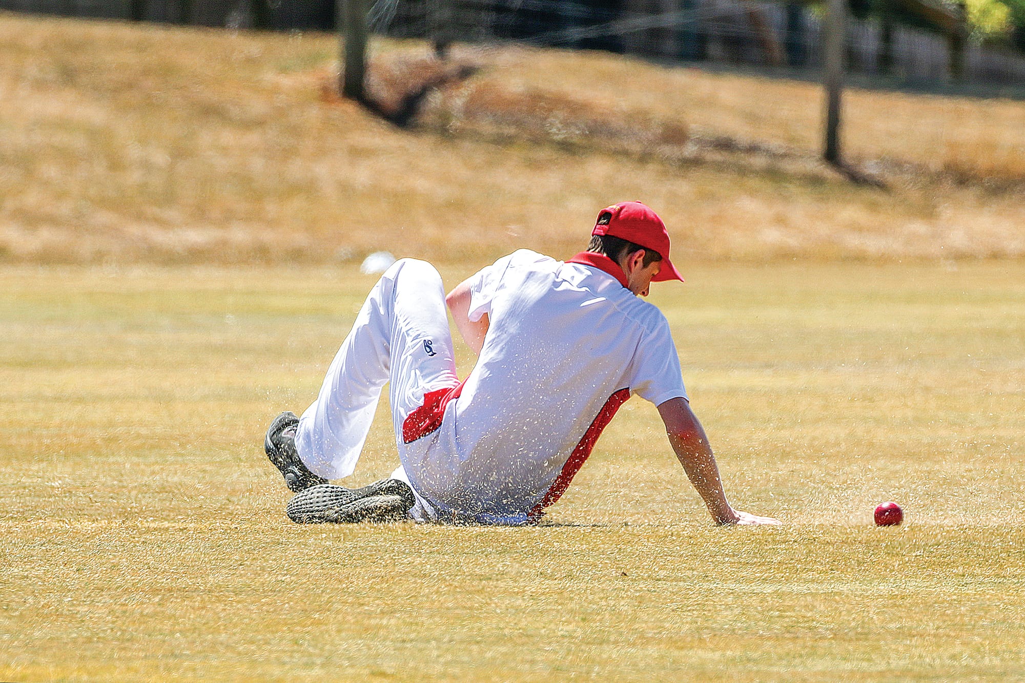Ned Brown’s slide was enough to stop a four. C52_0525