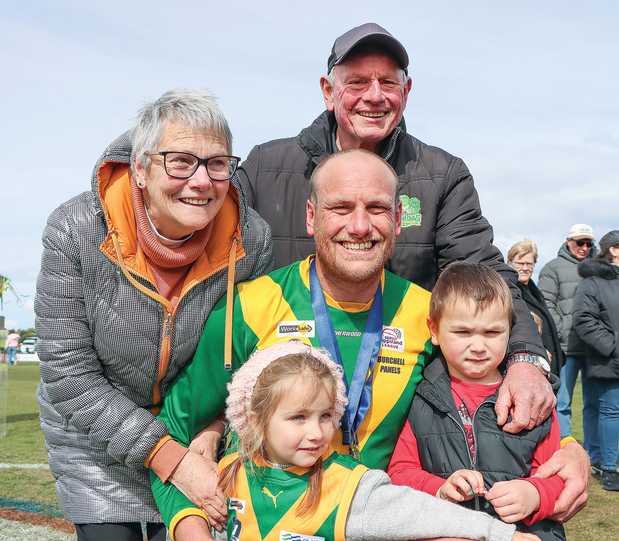 Dianne, John, Josh, Remi and Noah Schelling after John presented Josh with his Best on Ground medal for his part in the Parrots’ Reserves premiership. A63_3924