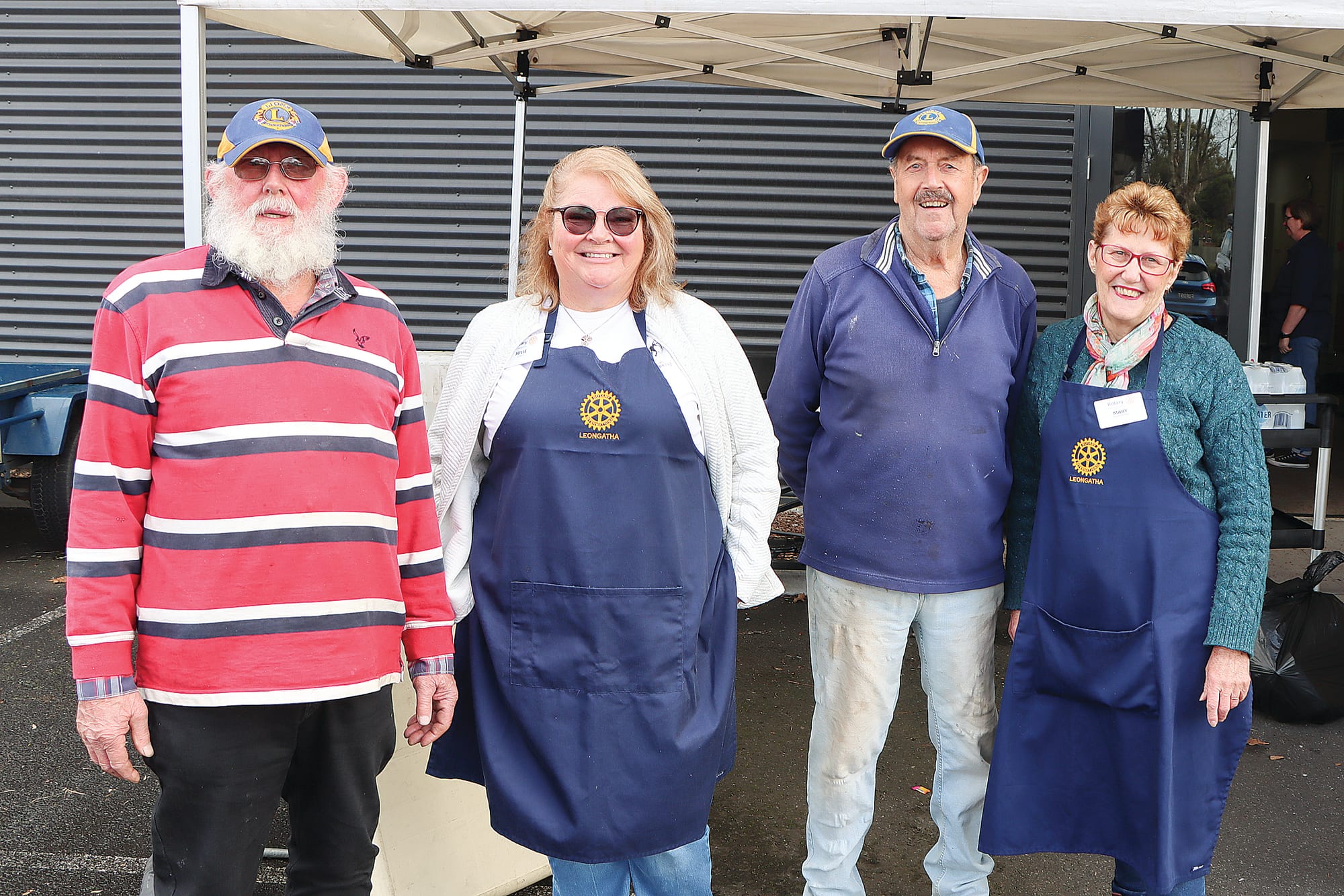 Local volunteers Marius Vanderligt (Lions), Julie Jones (Rotary), Lawrie Burge (Lions) and Mary Dortmans (Rotary) took charge of the snags at the Homelessness Week awareness raising event at The Salvation Army Leongatha centre. A05_3225