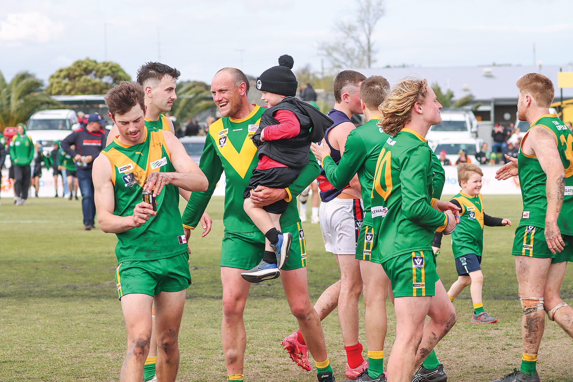 Leongatha players enjoy the moment after winning the Reserves Grand Final. A55_3924
