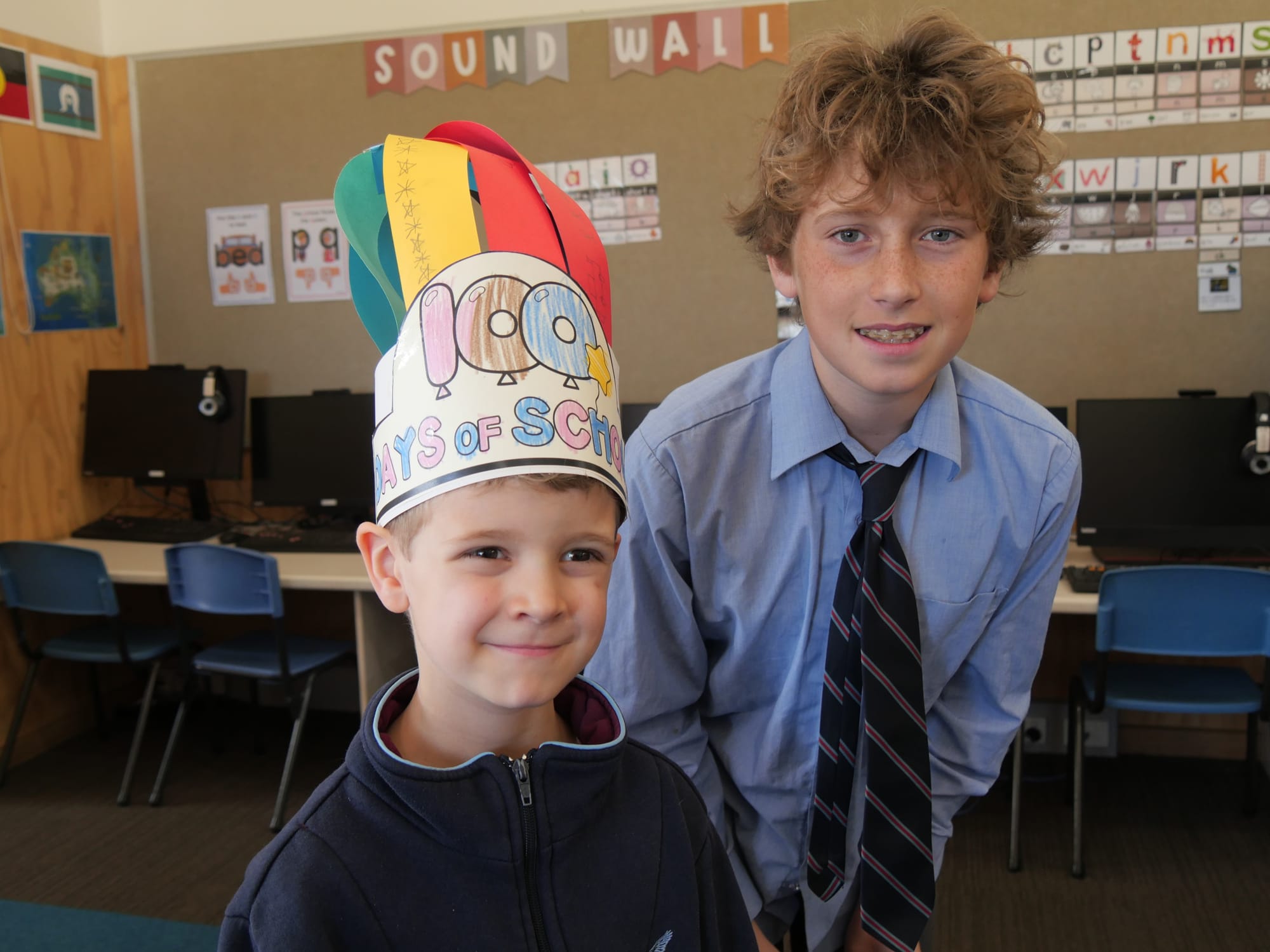Prep student Lorenzo Romano proudly wears his 100 days of School crown, which he made with the help of his Year 6 buddy Izaac Naarden.
