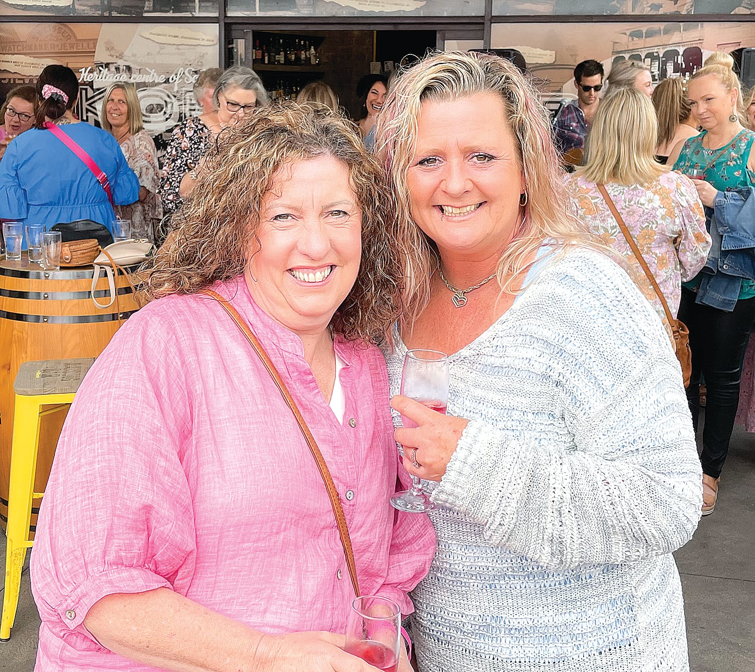 Michelle Dryden and Kim Cranston savour pink bubbles suited to the breast awareness message of Boobs & Bubbles.

