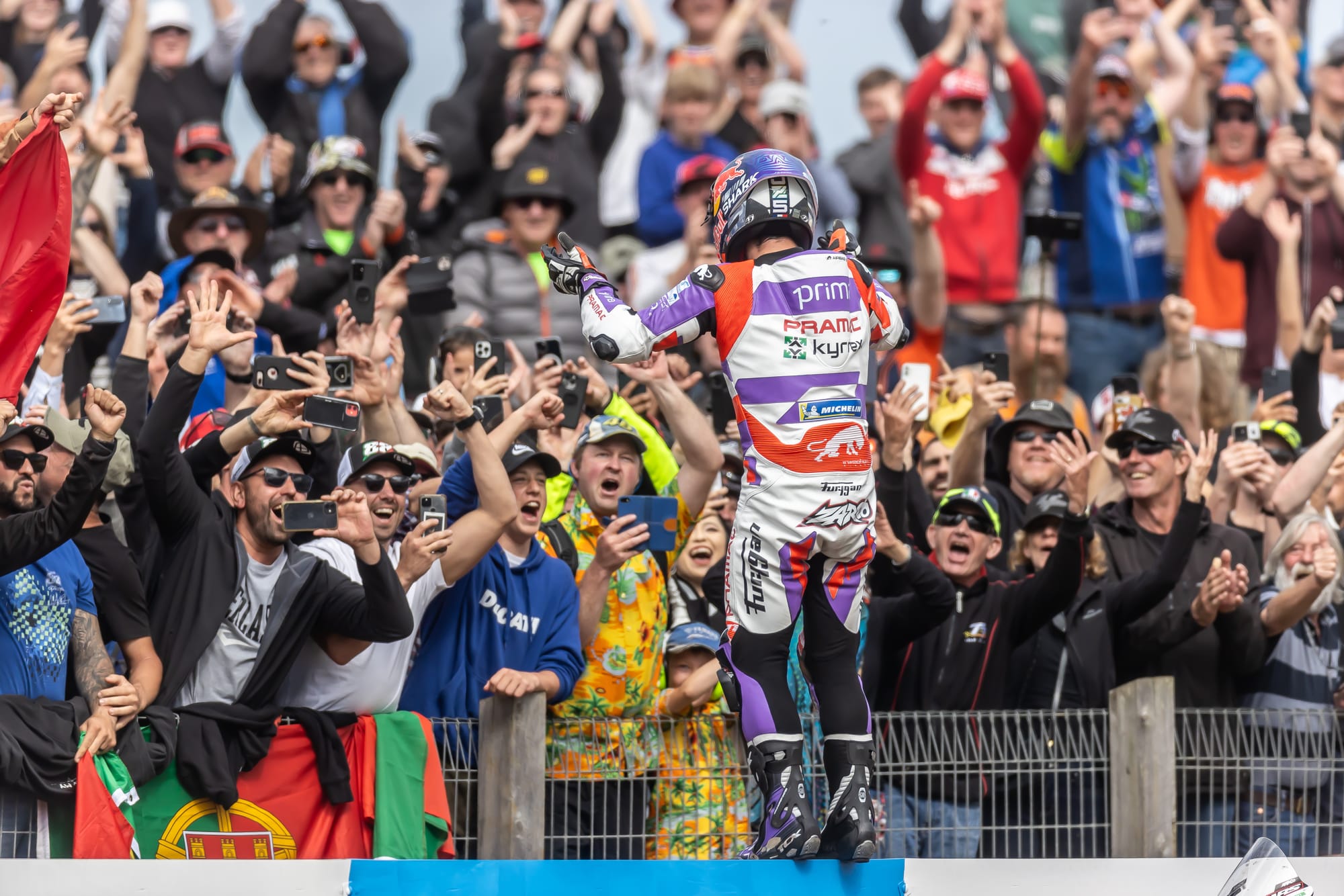 Jubilant Australian Grand Prix winner Johan Zarco sharing his victory celebrations with an appreciative crowd at turn five.