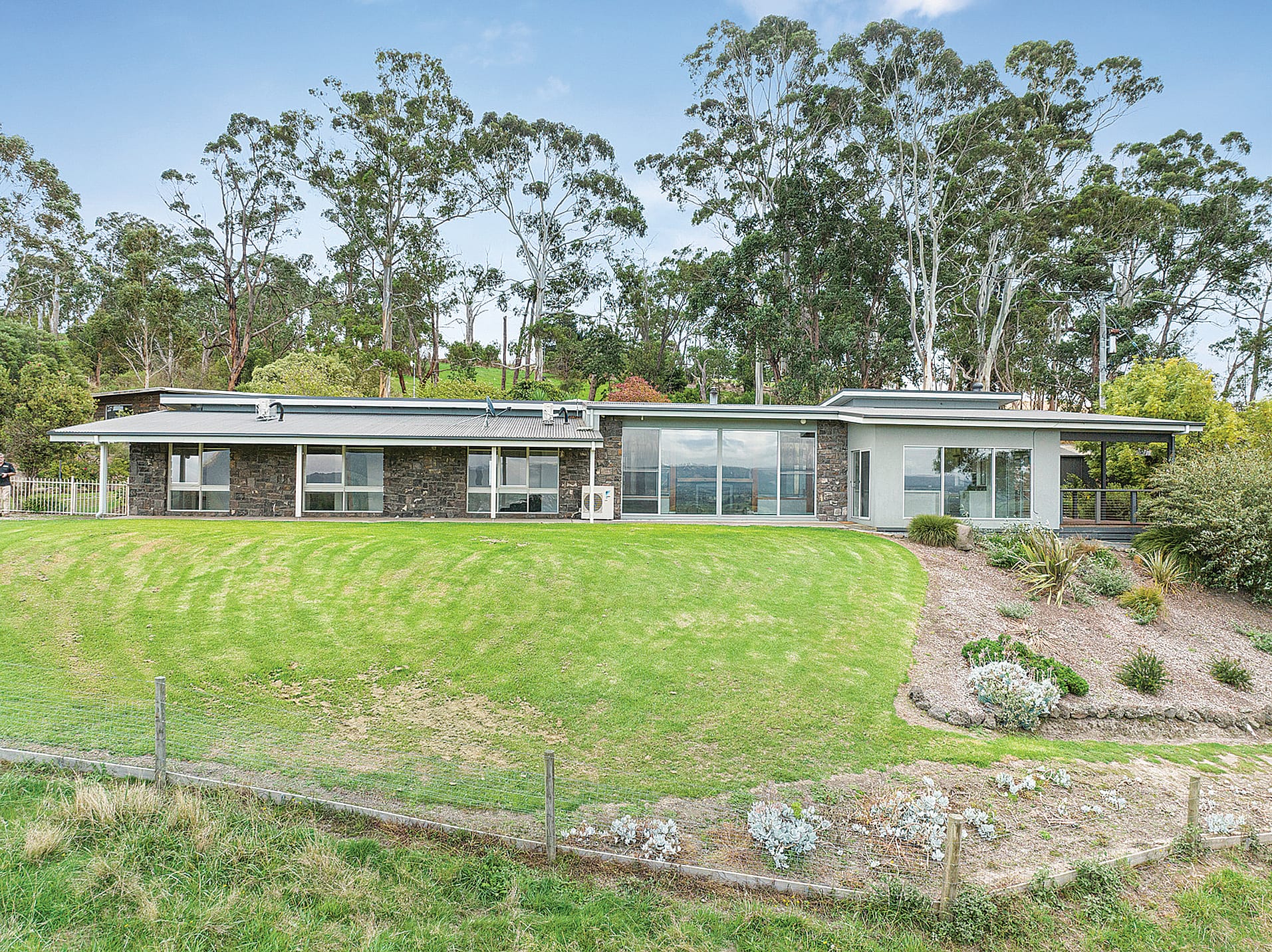 Creamery Road, Yinnar, from the moment you step inside the front door, the abundance of glass soaks up the views across the Yinnar Valley to the Jeeralang Ranges.