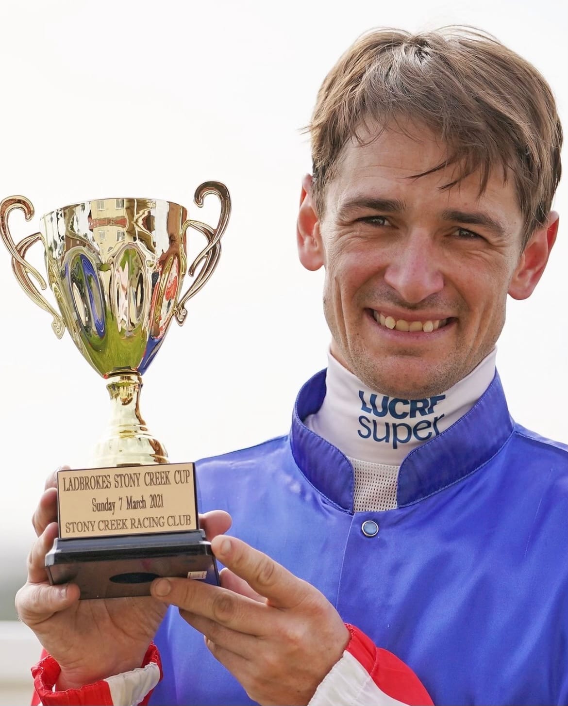 New Stony Creek Racing Club CEO Jason Benbow holds the 2021 Ladbrokes Stony Creek Cup won aboard Skelm.