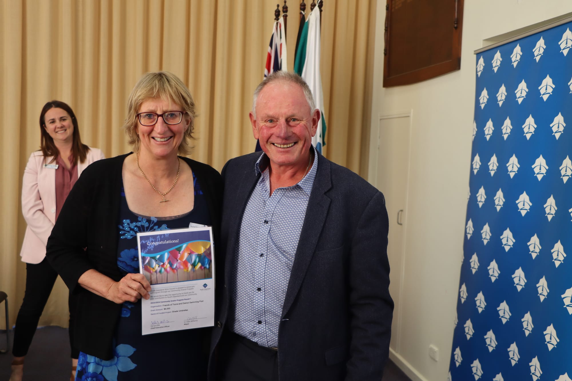 Rachel Brown of Friends of Toora & District Swimming Pool with Cr John Schelling.