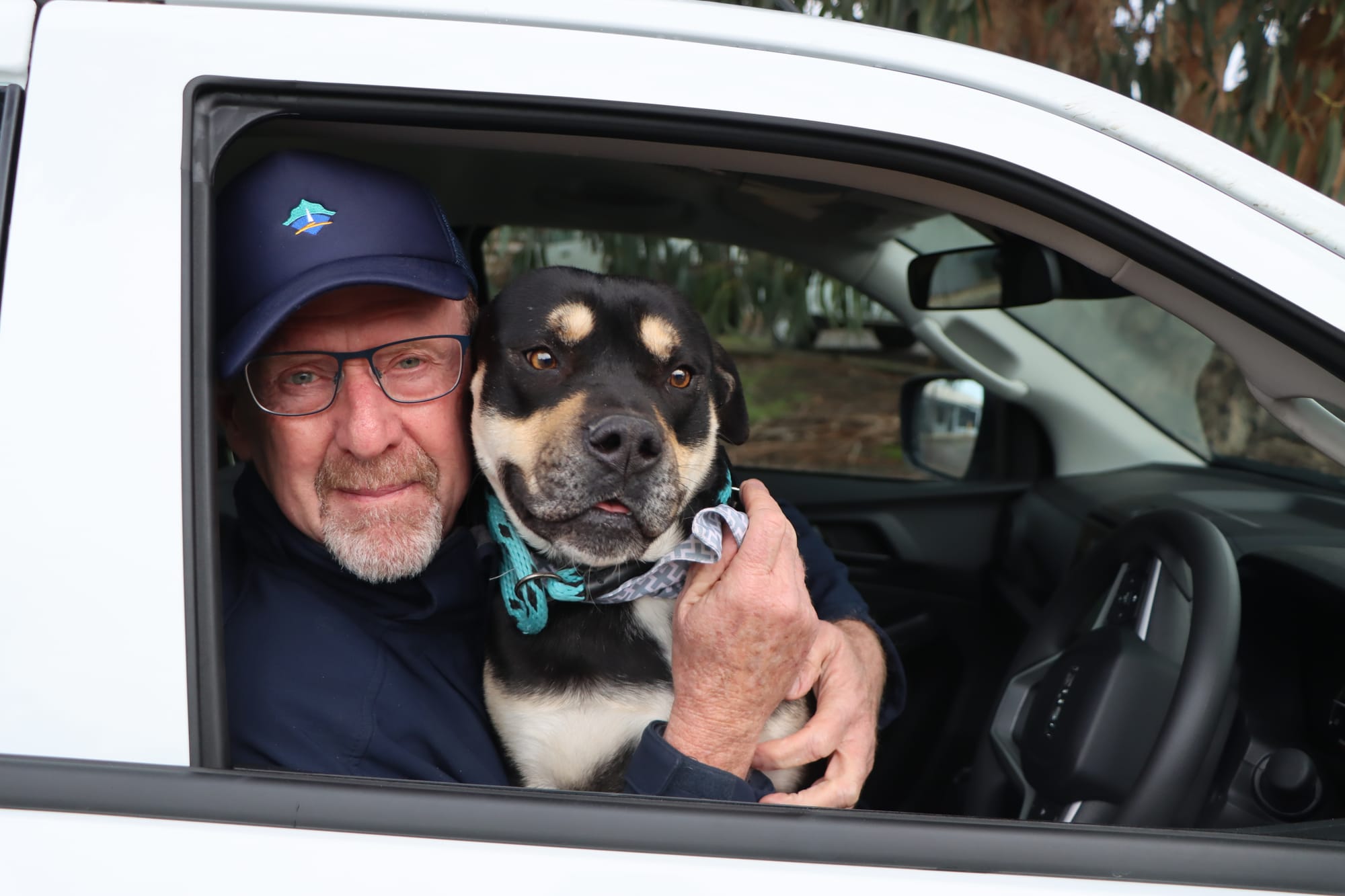 Bruce enjoys a hug from Rod Banks.
