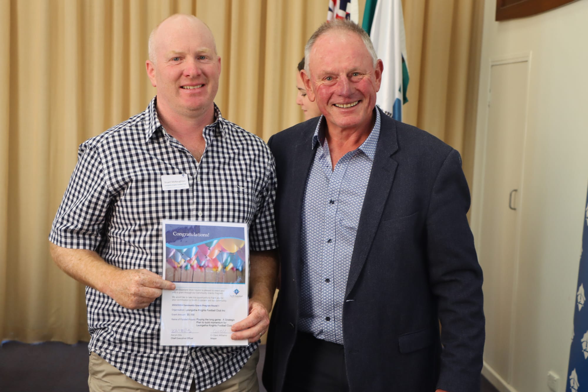 Stuart McNaughton of Leongatha Knights Football Club with Cr John Schelling.