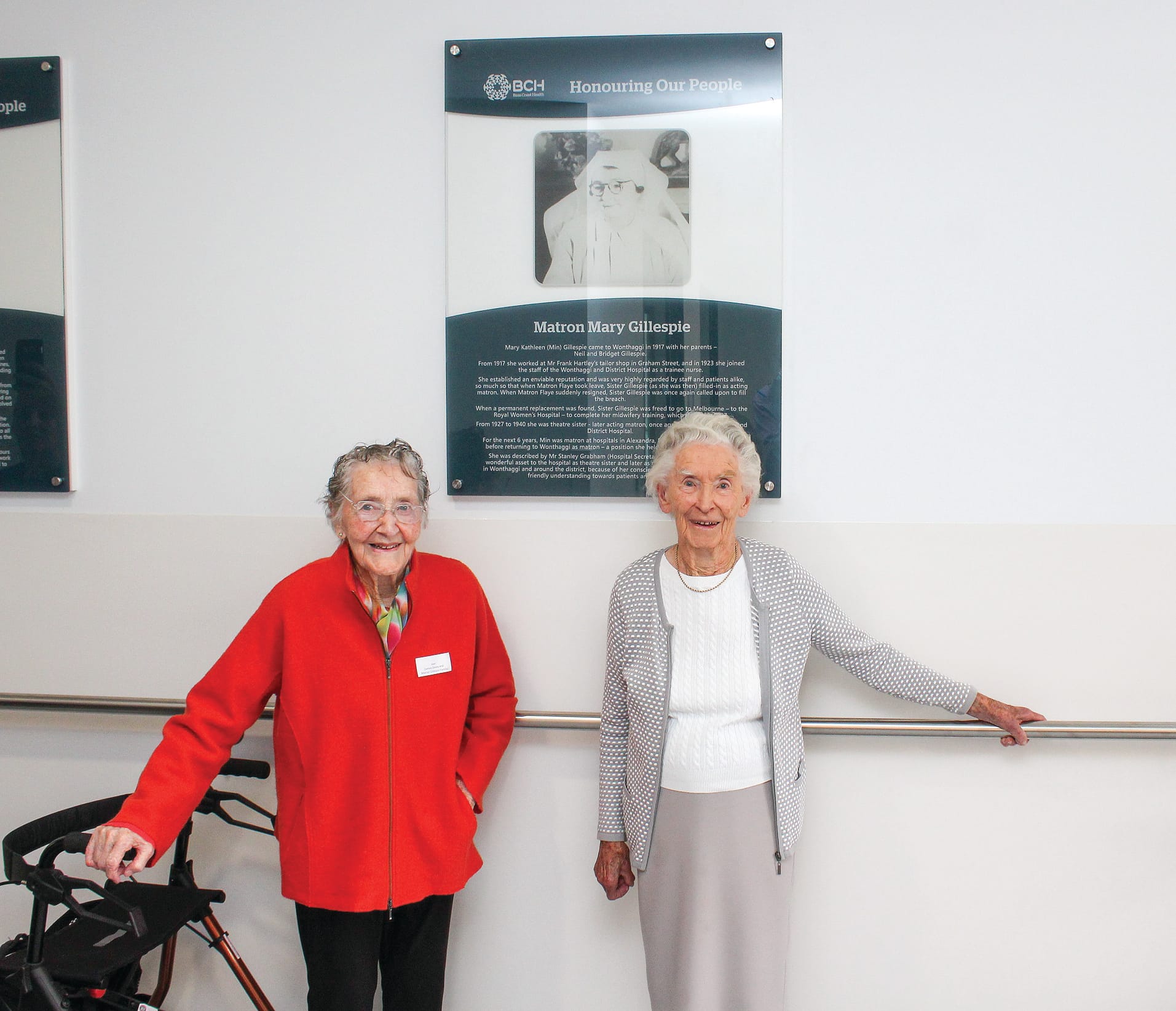 The family of Mary Kathleen (Min) Gillespie and her honour board, from left, Joan O’Neill and Marge Bagnara.